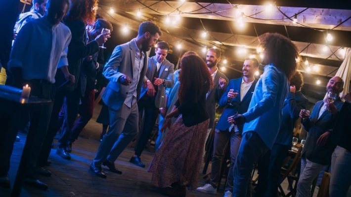 Beautiful,Carefree,Friends,Are,Dancing,Together,And,Celebrating,An,Evening